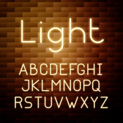 Obraz premium Yellow Glowing neon alphabet