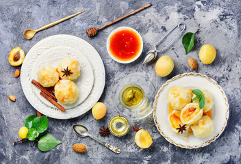 Dumplings with apricot and syrup