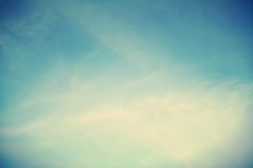 Obraz premium Fantastic white clouds and blue sky blackground.Creative vintage filter