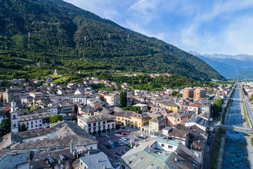 Fototapeta na wymiar City of Tirano and Adda river in Valtellina, aerial shot
