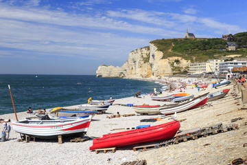 Boats on the peeble beach in Etretat Normandy France