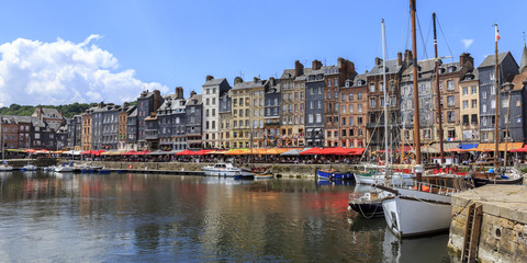 018 Honfleur, Normandy, France. Boats and houses in Honfleur, Normandy, France. 
