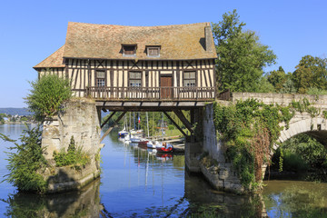 Fototapeta na wymiar Old timbered water mill over the Seine, Vernon, Normandy France