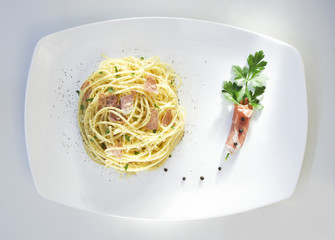 Isolated carbonara dish top view