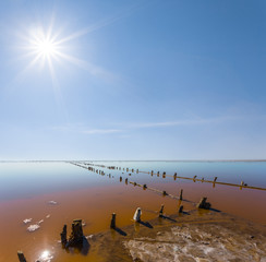 Naklejka premium old salt extraction factory on a saline lake coast