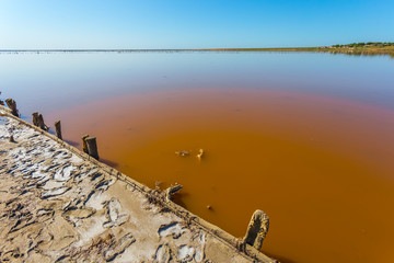 red salt lake scene, old salt extraction