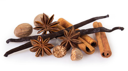 Assorted spices on white background