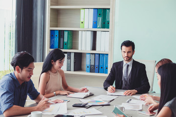 Manager and team meetig ideas exchange at meeting room.