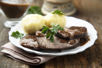 Original German sour beef with potato dumplings