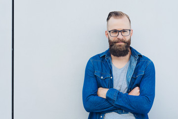 Intense young man staring at the camera