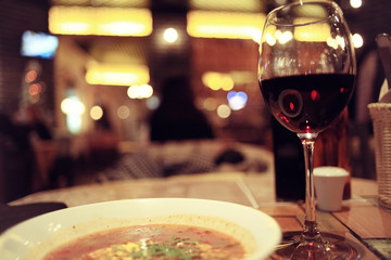 glass of red wine in restaurant interior