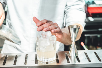 Bartender making alcoholic cocktails! Cocktail bar in summer 