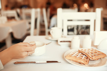 cup of coffee for breakfast in a cafe / serving cup of coffee in modern interior, a European breakfast
