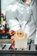 Bartender making alcoholic cocktails! Cocktail bar in summer 