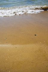 Soft wave of the sea on the sandy beach
