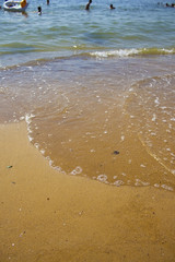Soft wave of the sea on the sandy beach