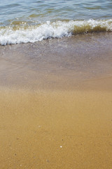 Soft wave of the sea on the sandy beach