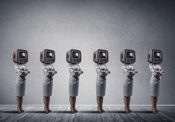 Business women with old TV instead of head.