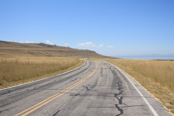 Solitary old road in Antelope Island Utah