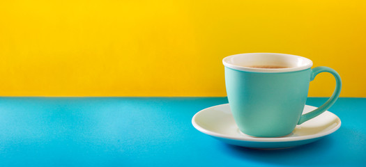 Cup of coffee with milk in a cup