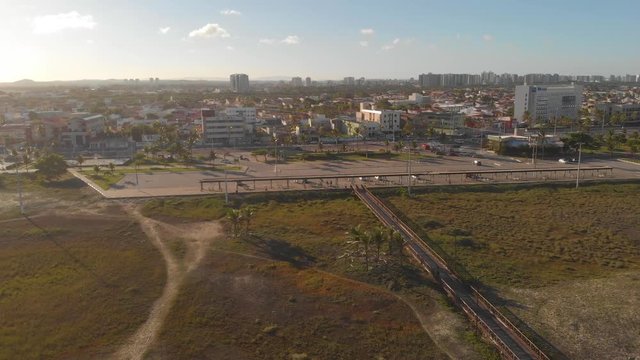 Aerial view of Aracaju and boardwalk leading to the beach in the afternoon