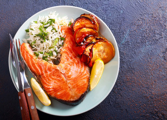 Salmon steak, rice and vegetable casserole