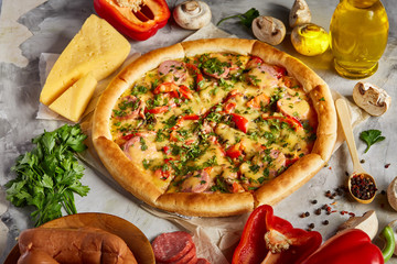 Tasty Italian pizza and its ingredients on white textured background.