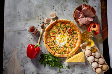 Tasty Italian pizza and its ingredients on white textured background.
