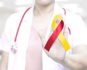Red and Yellow awareness ribbon for Hepatitis C, HIV/HCV Co-Infection and Surviving family members of Suicide victims.World hepatitis day