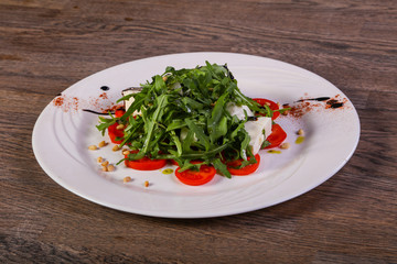 Caprese salad with arugula