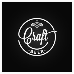 Fototapeta na wymiar Craft beer vintage logo on black background