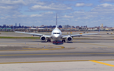 Jet Airliner on tarmac of runway at airport