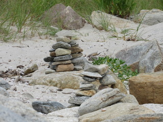 Stacks of rocks and stones on the beach 