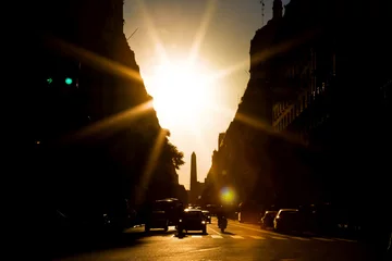 Foto op Canvas Avenue with solar backlight and obelisk of Buenos Aires in the background © simonmayer