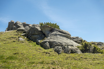 View of Bucegi Mountains, Bucegi National Park, Romania, clear blue sky, few clouds, sunny summer day, perfect for hiking