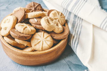Christmas cookies almond and chocolate on a gray old table, close-up. Copy spase
