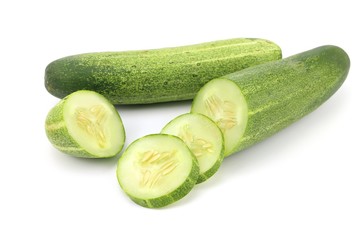green cucumber on white background
