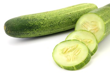 green cucumber on white background