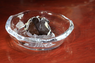 Close up small chocolate cake on small glass cup