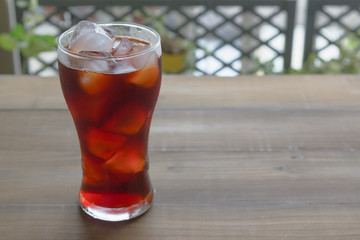 Ice black tea on the wooden table,Selective Focus