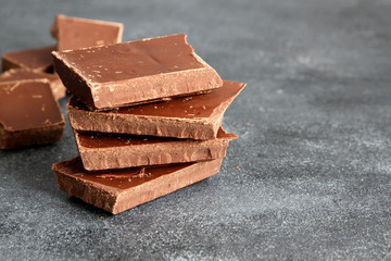 Black chocolate on dark background, close-up