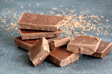 Black chocolate on dark background, close-up