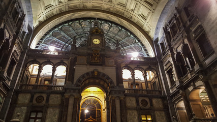 Fototapeta premium Antwerp/Belgium - December 2 2016: beams of light peek through the windows of the central hall at the main train station of Antwerp