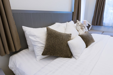 Fototapeta na wymiar Modern styles bedroom in resort with king size single bed