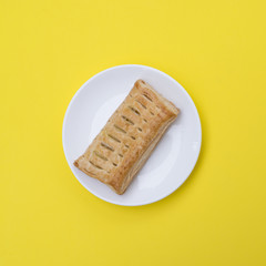 Pies on a white plate.
