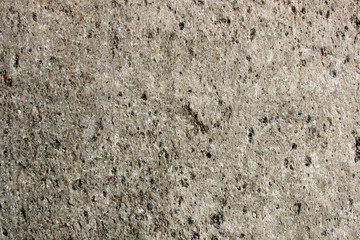 concrete wall with stones