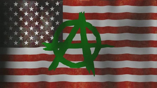 Close up US flag with anarchy symbol on it.