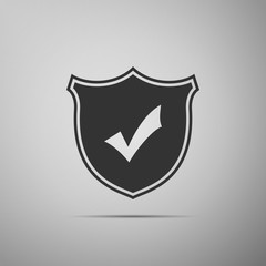 Shield with check mark icon isolated on grey background. Flat design. Vector Illustration