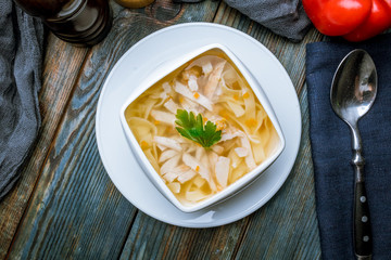 Chicken soup bouillon in a plate