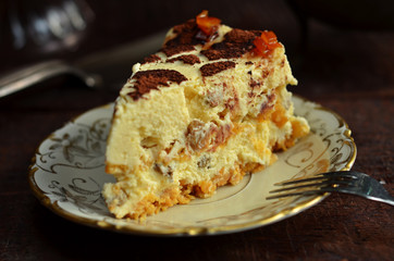A piece of vanilla cheesecake on a rustic plate